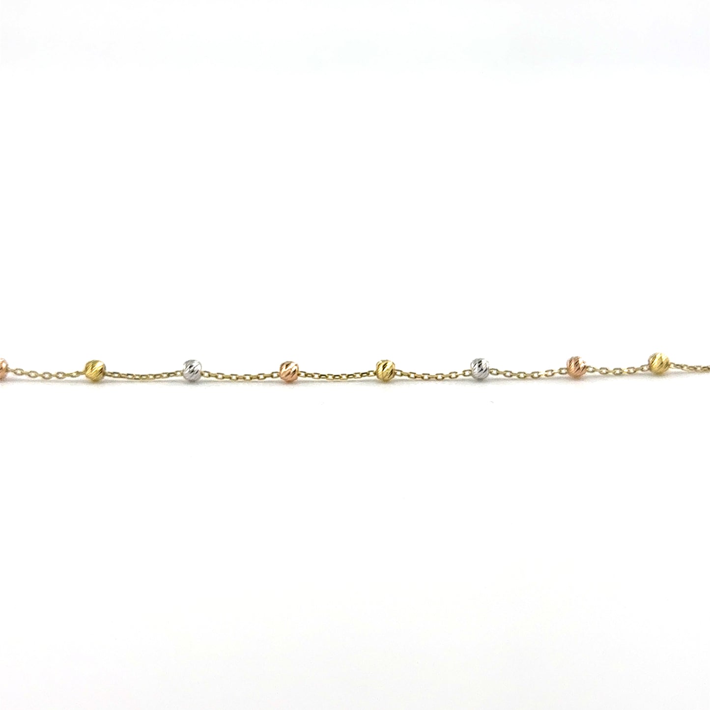 Pulsera (bolita) en Oro Tres Tono