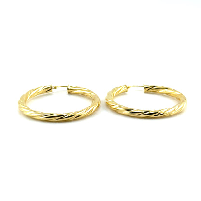 Argollas Retorcido en Oro 10K
