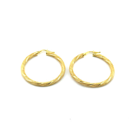 Argollas (corte diamante) en Oro 10K