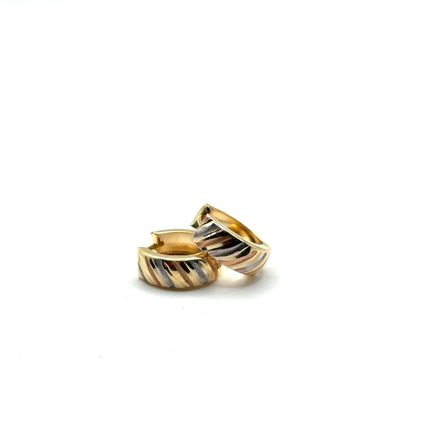 Huggies en Oro 10K Tres Tonos