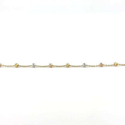 Pulsera (bolita) en Oro Tres Tono