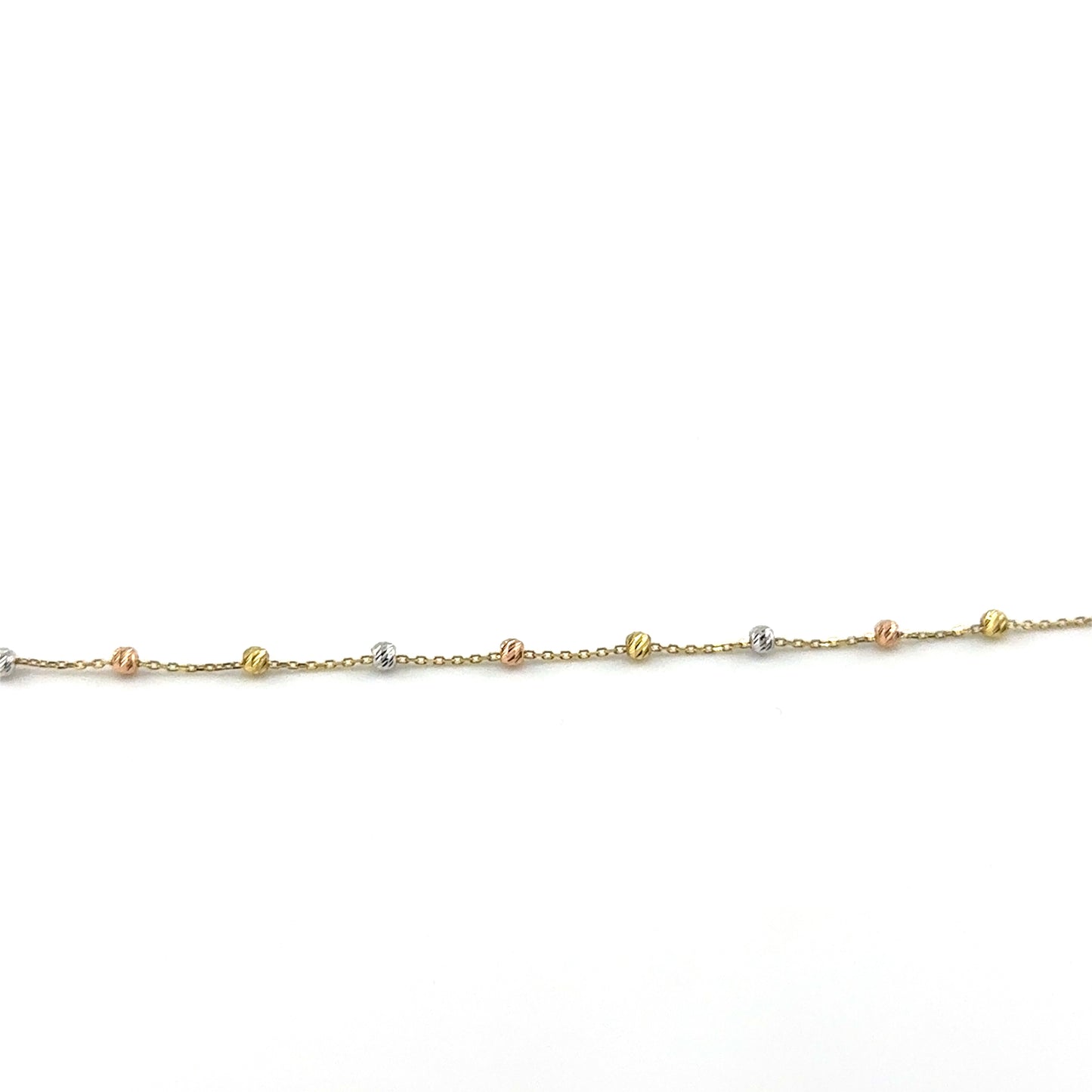 Pulsera (bolita) en Oro Tres Tono