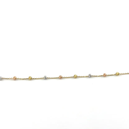 Pulsera (bolita) en Oro Tres Tono