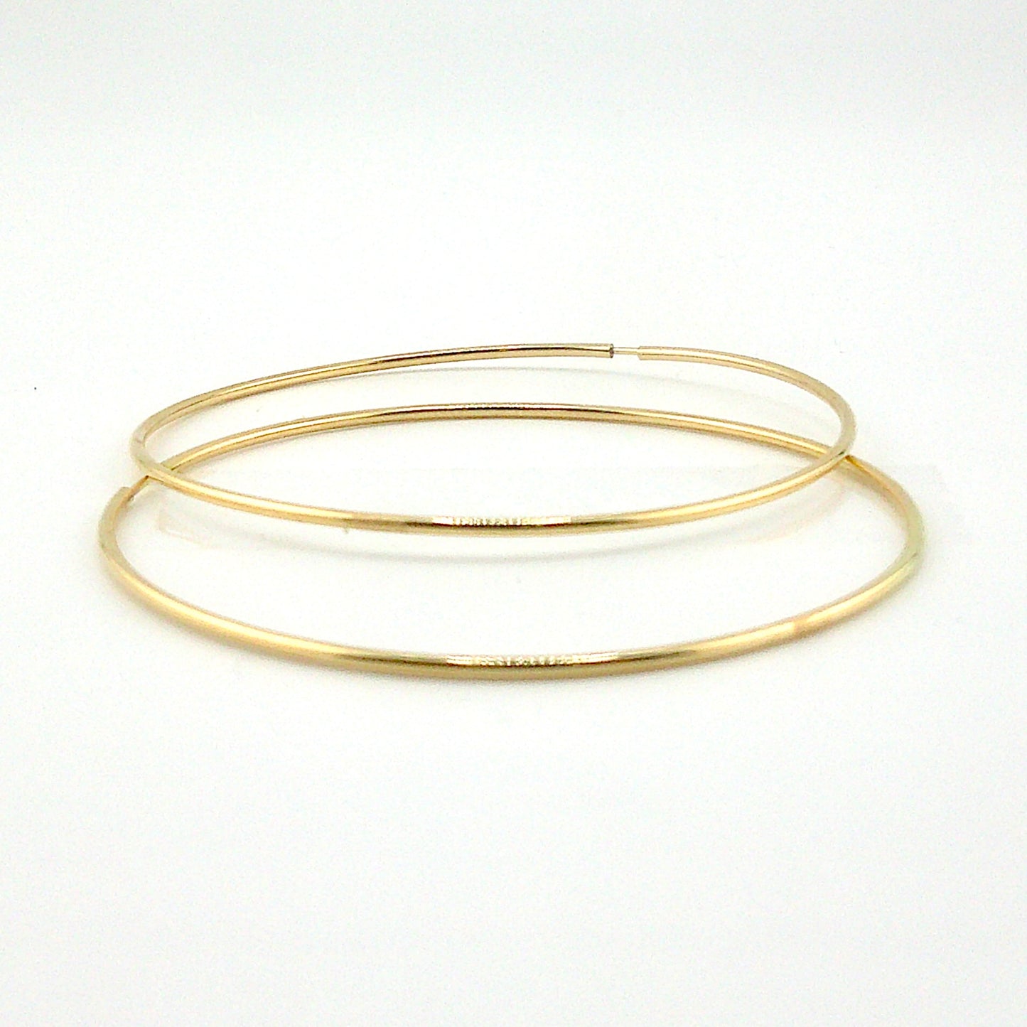 Argollas Flexible en Oro 18K