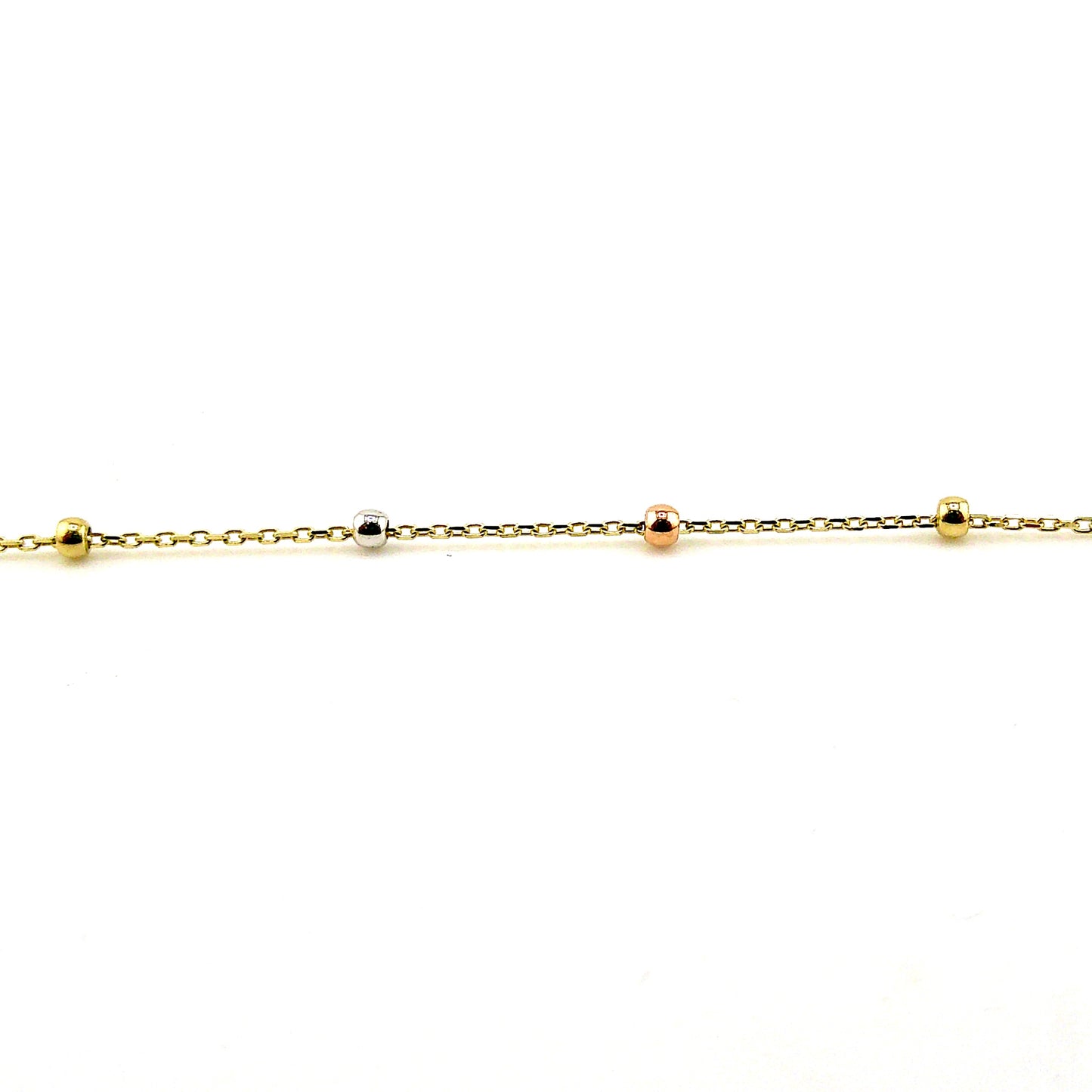 Pulsera (cruz) en Oro Tres Tono